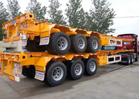 Κίτρινο επίπεδης βάσης 3 αξόνων φορτηγό ρυμουλκών εμπορευματοκιβωτίων ημι που φέρνει το βαρύ εξοπλισμό